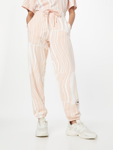 ADIDAS BY STELLA MCCARTNEY Tapered Workout Pants 'Truecasuals' in Pink: front