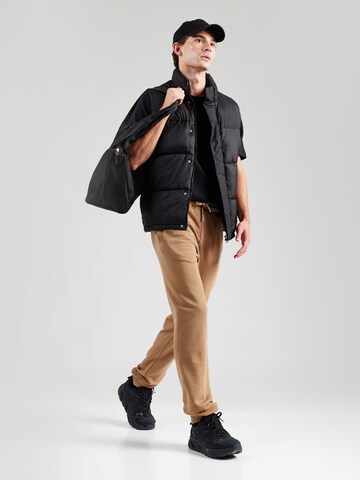 FILA Tapered Sporthose 'BRAIVES' in Braun