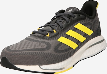 Chaussure de course 'Supernova+' ADIDAS SPORTSWEAR en gris : devant