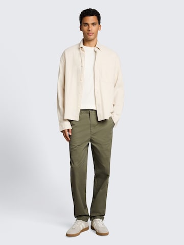 TOM TAILOR DENIM Regular Chinohousut värissä vihreä