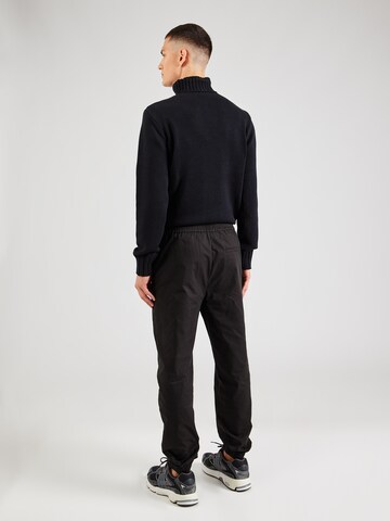 TRAPP Tapered Trousers in Black