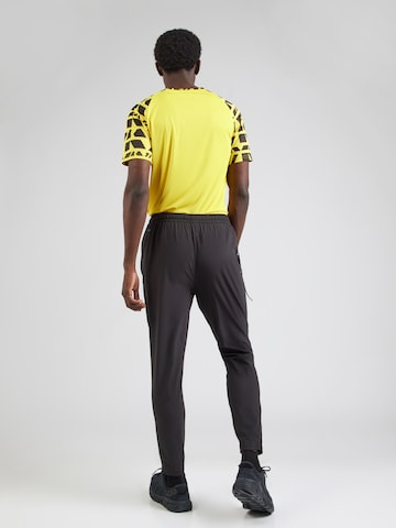 PUMA Tapered Sportbroek 'FLEX' in Zwart