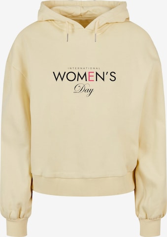 Merchcode Sweatshirt 'WD - International Women's Day' in Geel: voorkant