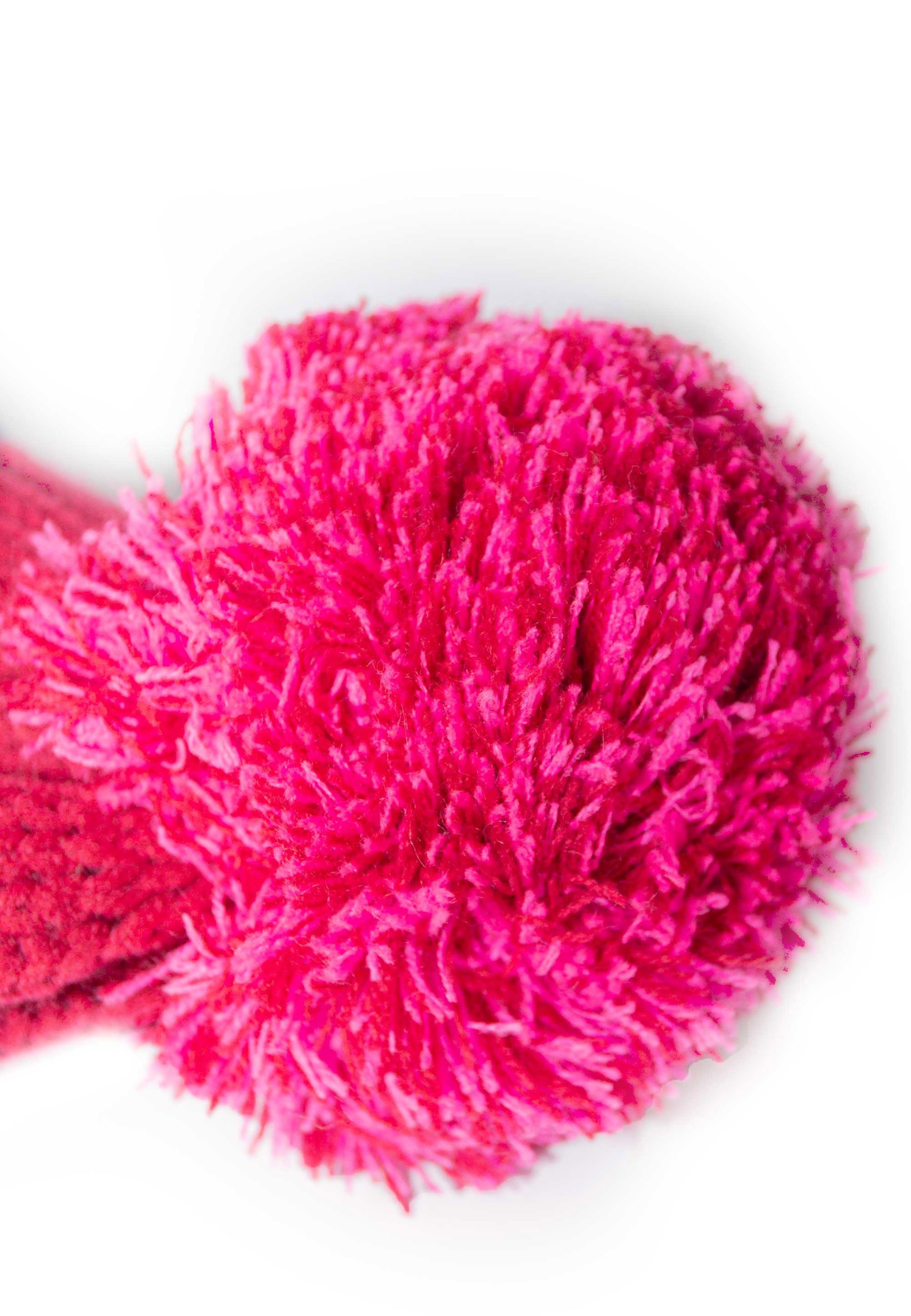 REUSCH Bommelmütze 'Enzo' in Pink