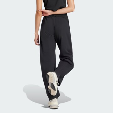 ADIDAS SPORTSWEAR Loosefit Παντελόνι φόρμας 'City Escape' σε μαύρο
