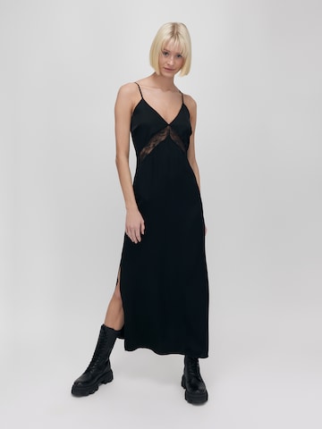 UNFOLLOWED x ABOUT YOU - Vestido 'REVENGE' en negro: frente