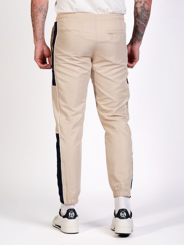 Sergio Tacchini Tapered Sporthose 'Abita' in Beige