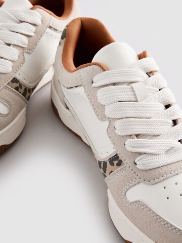 Baskets basses Next en blanc