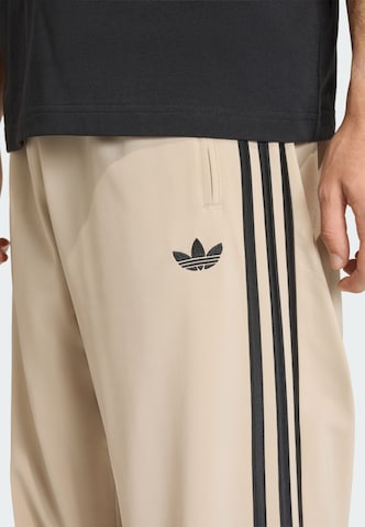 regular Pantaloni 'Firebird' di ADIDAS ORIGINALS in verde