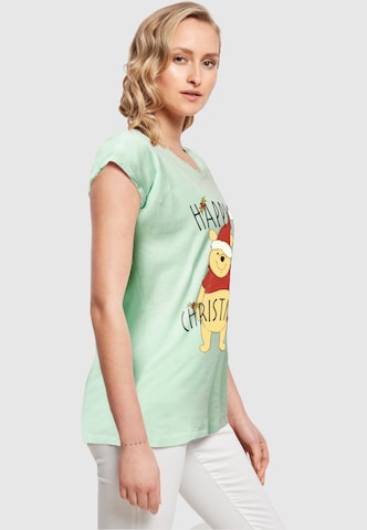 ABSOLUTE CULT T-Shirt 'Winnie The Pooh - Happy Christmas Holly' in Grün