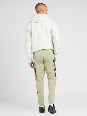ADIDAS SPORTSWEAR Tapered Sports trousers 'Future Icons' in Green