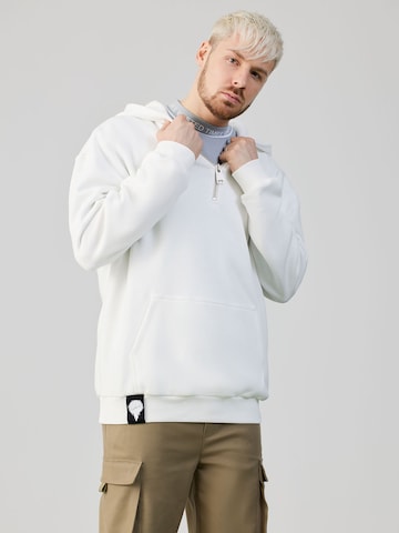 ABOUT YOU x Rewinside Sweatshirt 'Elias' i vit: framsida