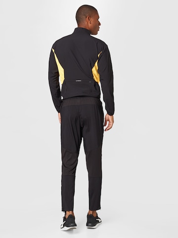 PUMA Regular Sports trousers in Black