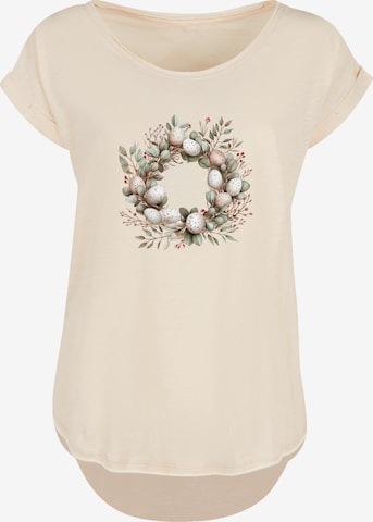 T-shirt 'Osterkranz Eierkranz Blumenring' F4NT4STIC en beige : devant