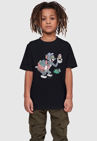 ABSOLUTE CULT T-Shirt 'Tom And Jerry - Tom Egg Hunt' in Schwarz: predná strana