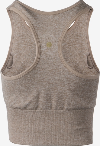 Athlecia Medium Support Sports Bra 'Flowee' in Beige