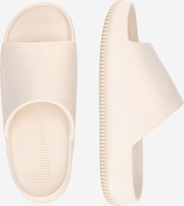 Nike Sportswear Mules 'CALM' in Rose ABOUT YOU