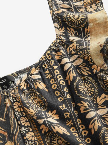 Robe Next en noir