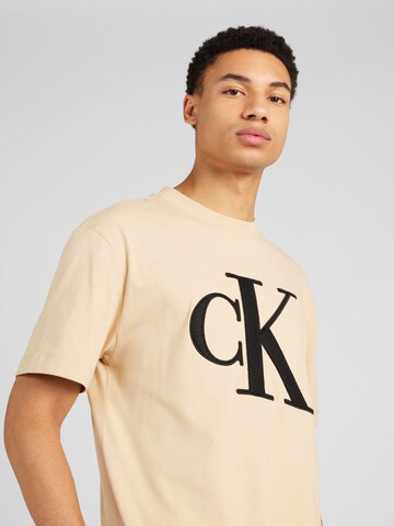 Maglietta di Calvin Klein Jeans in beige