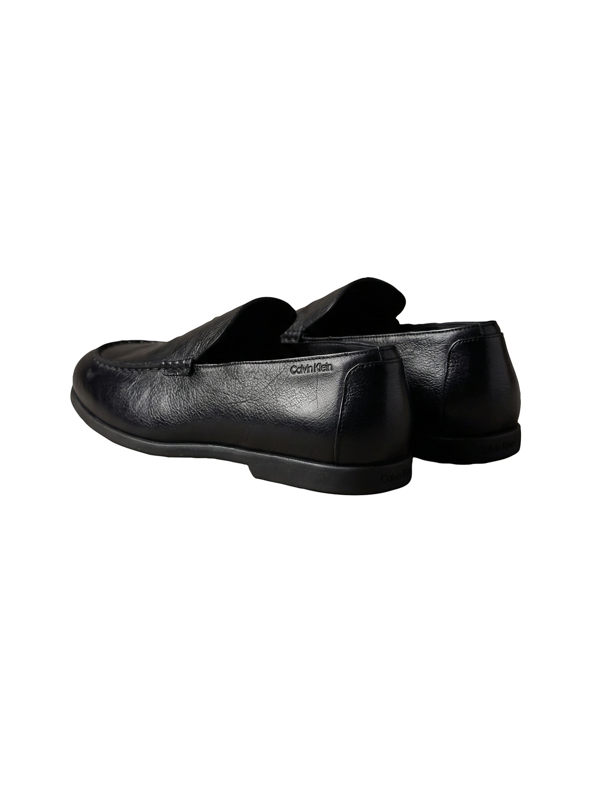 Calvin Klein Slip-ons in Black