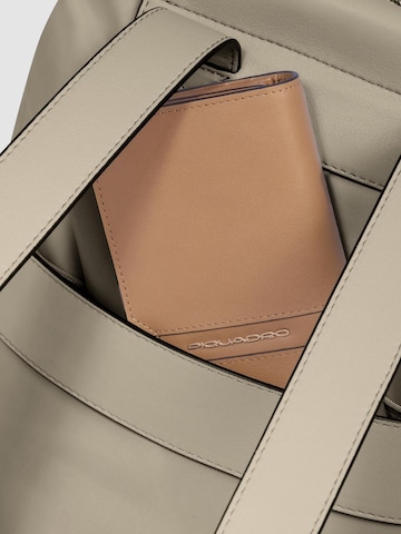 Sac à dos Piquadro en beige