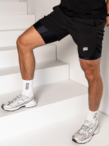 Fortex Fitness Regular Sportbroek 'Active 2-in-1 Shorts' in Zwart: voorkant