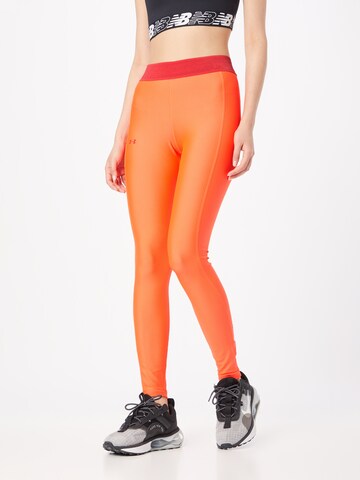 Skinny Pantaloni sportivi di UNDER ARMOUR in arancione: frontale