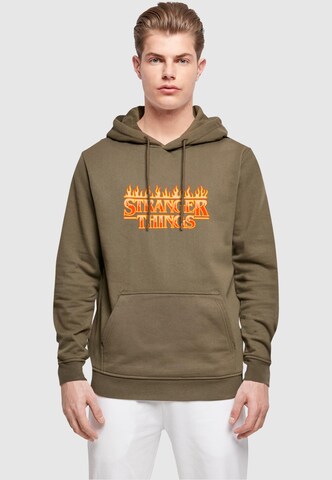 Sweat-shirt 'Stranger Things - Fire' ABSOLUTE CULT en vert : devant