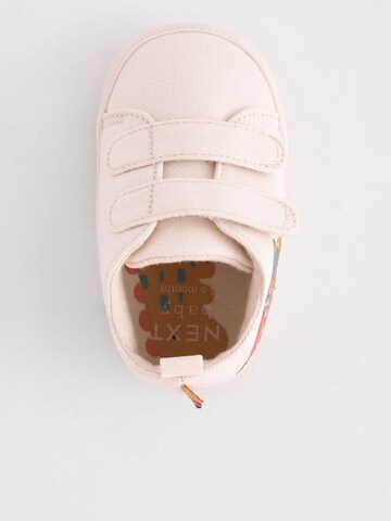 Neonato di Next in beige