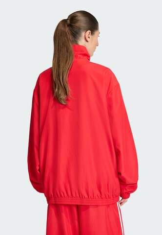 ADIDAS ORIGINALS Between-season jacket 'Firebird Adilenium' in Red