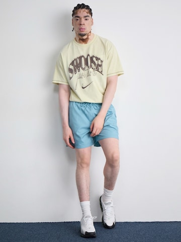 Nike SportswearLoosefit Hlače 'Club' - plava boja