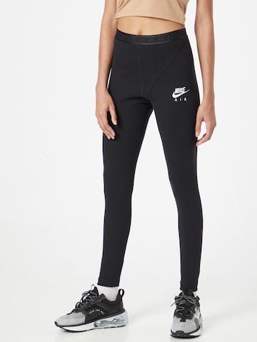 Leggings di Nike Sportswear in nero: frontale