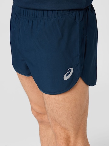 ASICS - Slimfit Pantalón deportivo en azul