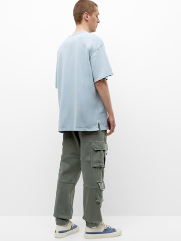 Pull&Bear Дънки Tapered Leg Карго панталон в зелено