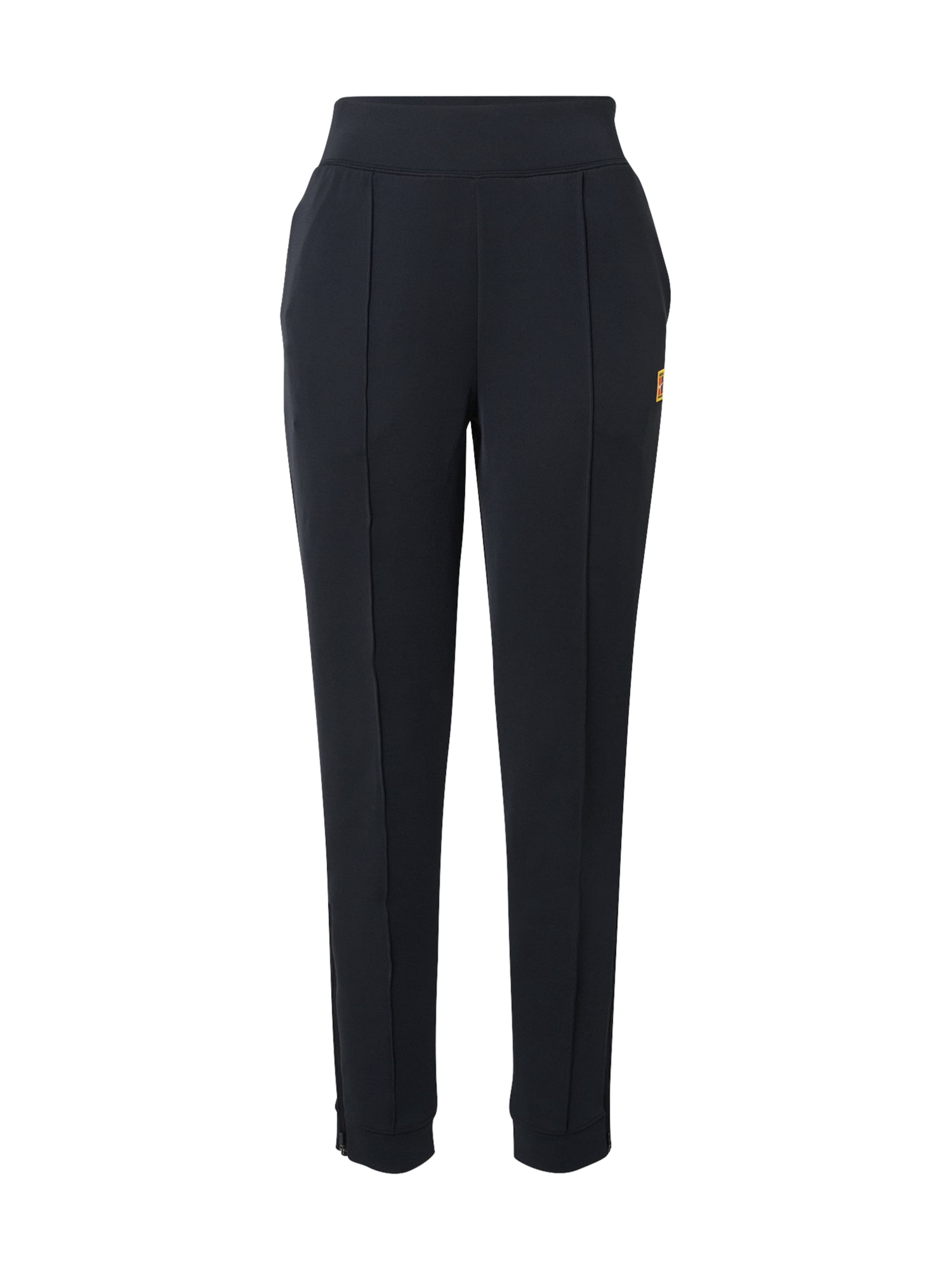 NIKE Tapered Sports trousers 'Heritage' in Black: front