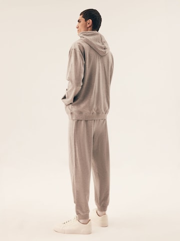 Felpa 'Kapuzensweatshirt Motion, French Terry, mit Rippbündchen' di Henderson in grigio