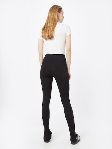 ALPHA INDUSTRIES Slimfit Leggings i sort