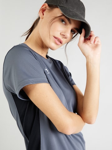 T-shirt fonctionnel UNDER ARMOUR en gris