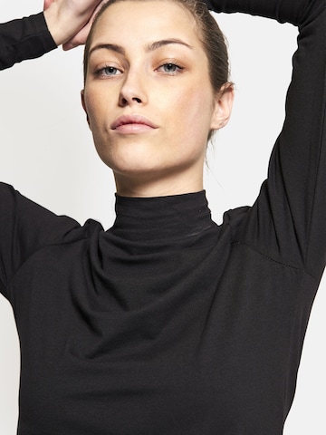 Squad the label Turtleneck 'Organic Long Sleeve' in Schwarz