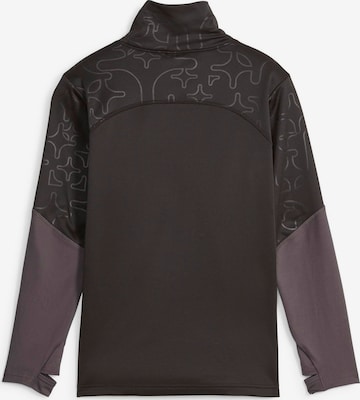 PUMA Functioneel shirt 'Individual Winterized' in Zwart