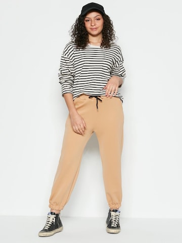 C&City Trousers in Beige: front
