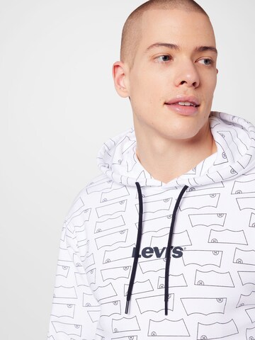 LEVI'S ®Regular Fit Sweater majica 'Relaxed Graphic Hoodie' - bijela boja