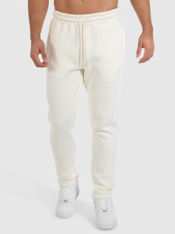 Coupe slim Pantalon 'Evra' Smilodox en beige : devant