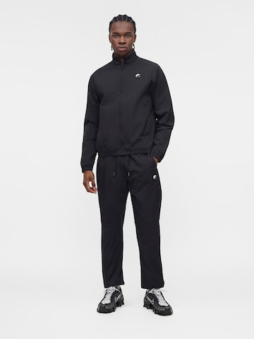 Trening 'AIR' de la Nike Sportswear pe negru: față