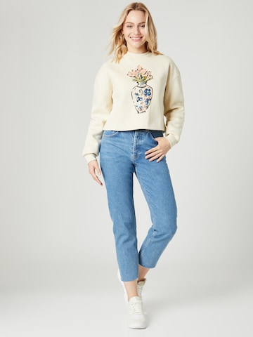 Guido Maria Kretschmer Women Sweatshirt 'Noelle' in Beige