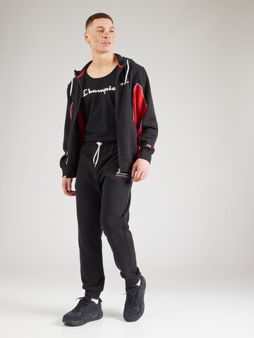 Maglietta di Champion Authentic Athletic Apparel in nero