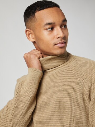 Kosta Williams x About You Sweater in Beige