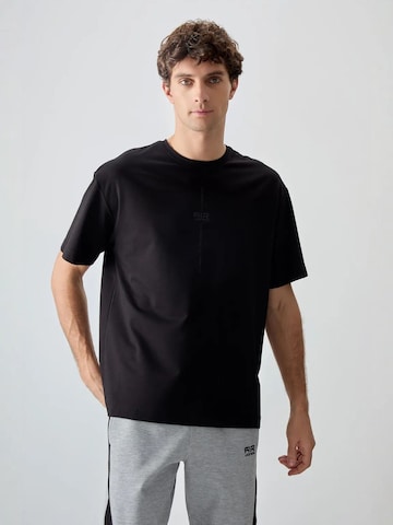 T-Shirt Tommy Life en noir : devant
