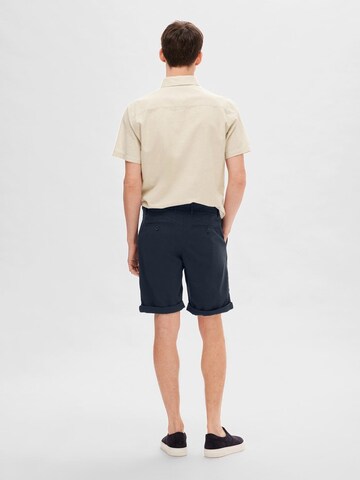 SELECTED HOMME - Loosefit Calças chino 'Luton' em azul