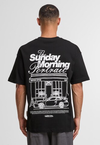 Another Cotton Lab T-Shirt 'Sunday Morning' in Schwarz: Vorderseite